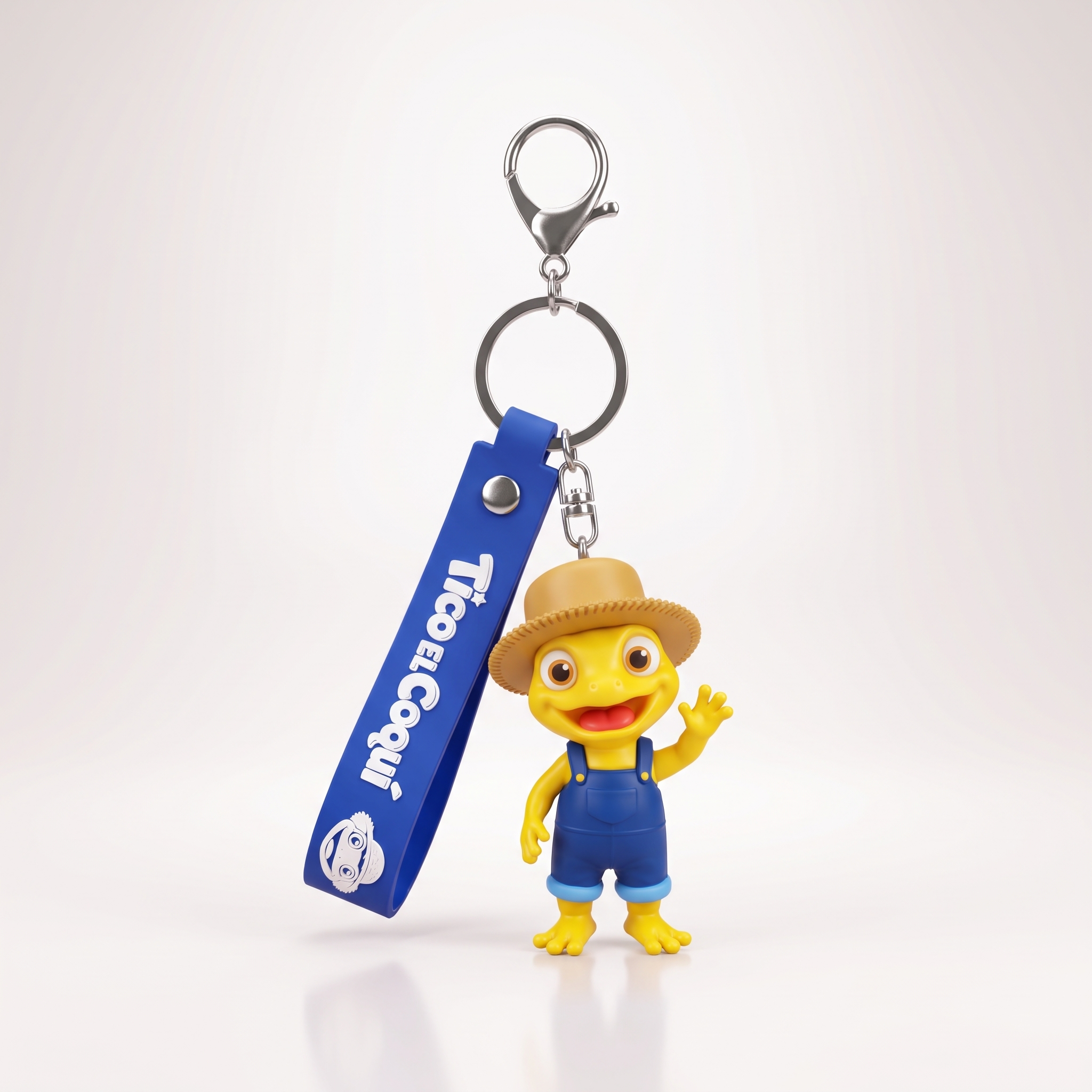 Llavero Tico el Coquí – figura de 6 cm con correa azul, de pie